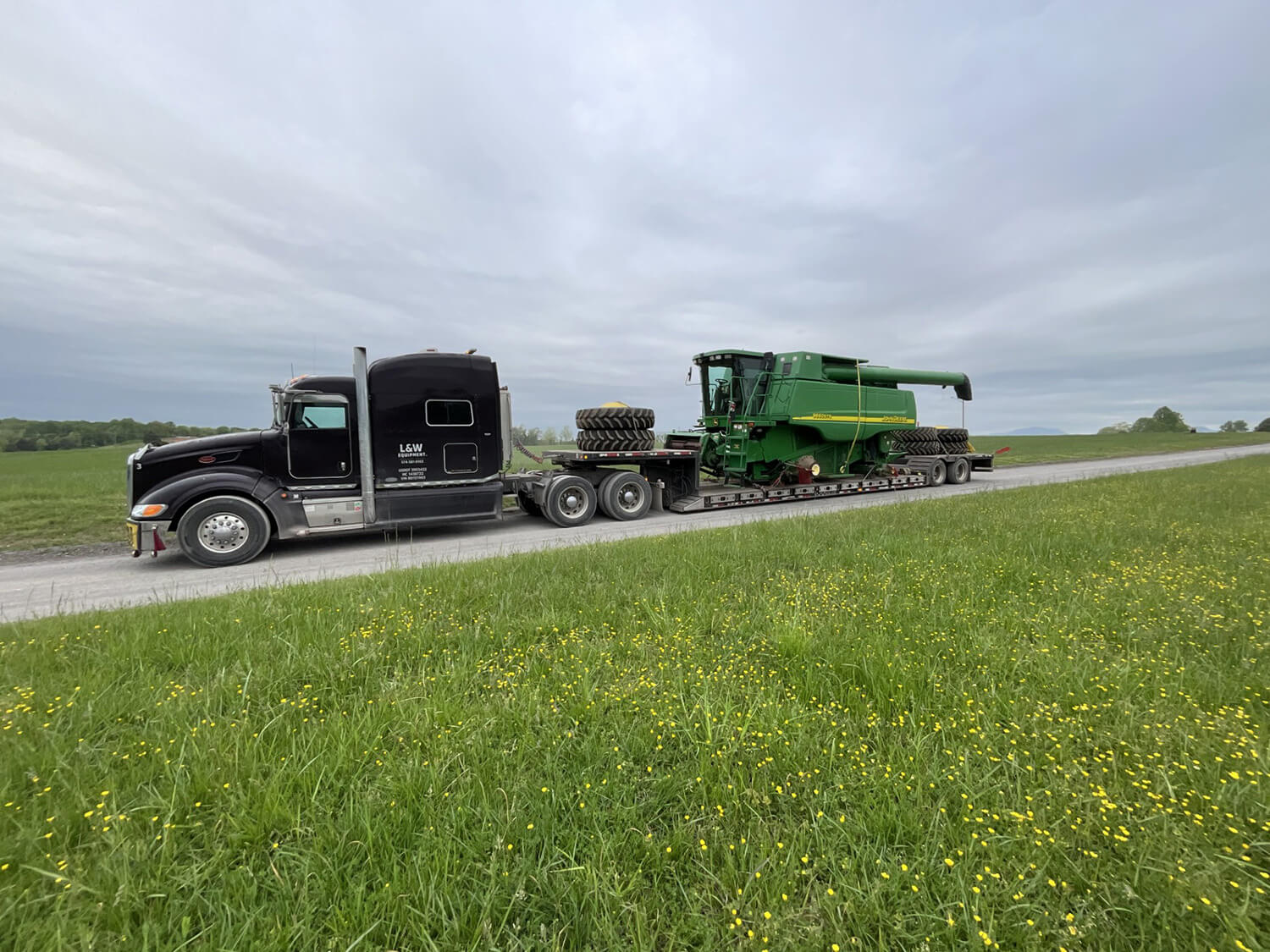Semi Hauling a Combine